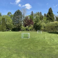 Spielen auf der grünen Wiese des Hotel Restaurant Erber